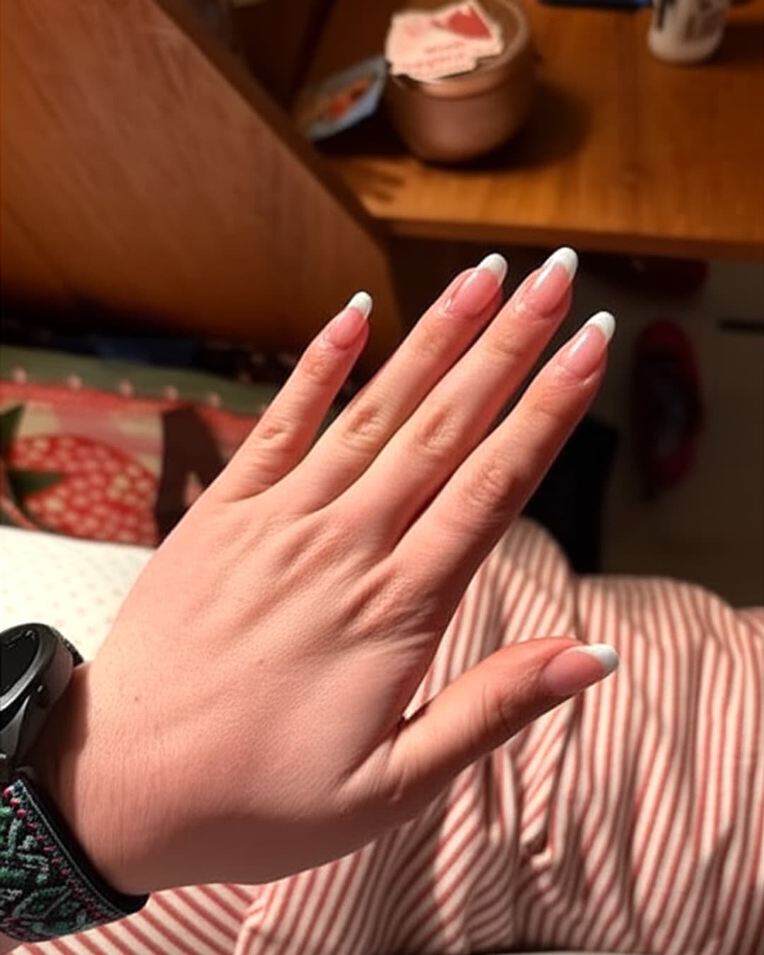 Classic white French tips on medium square nails