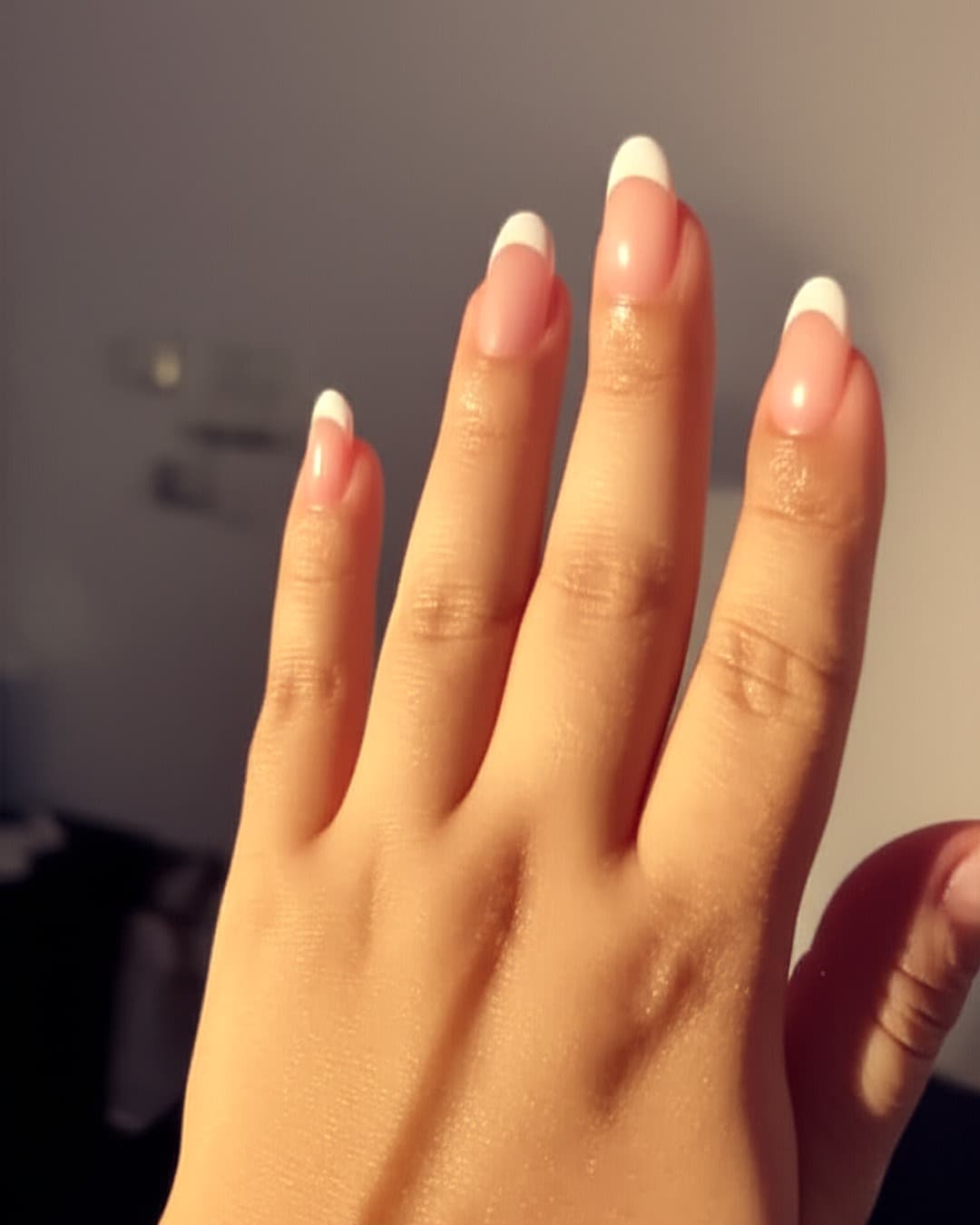 Soft white French tips on squoval nails