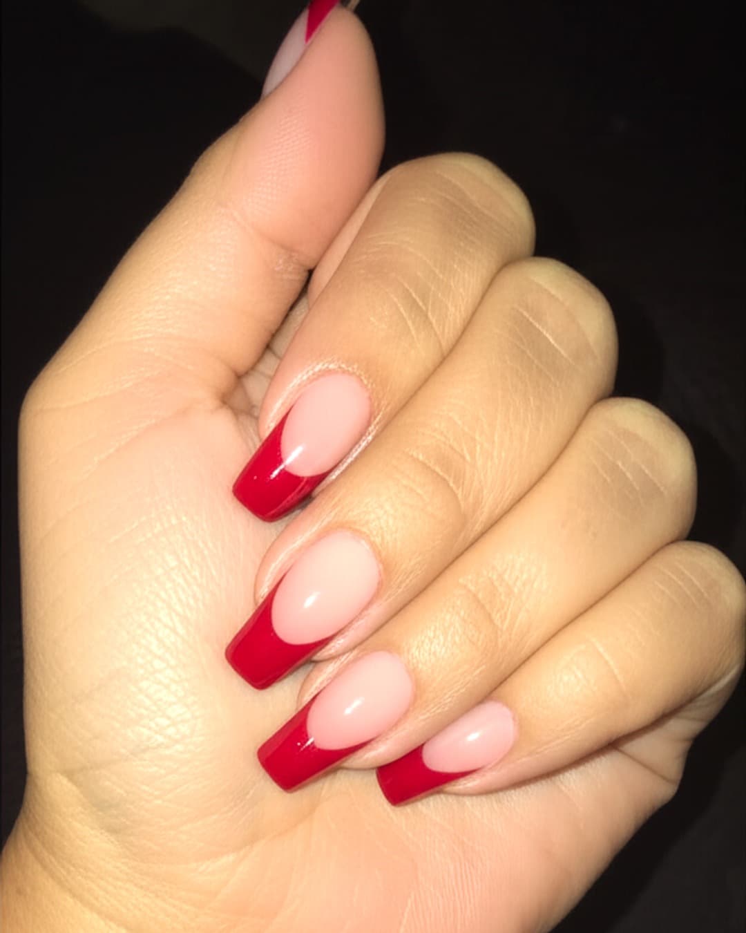 Red French tips on tapered square nails